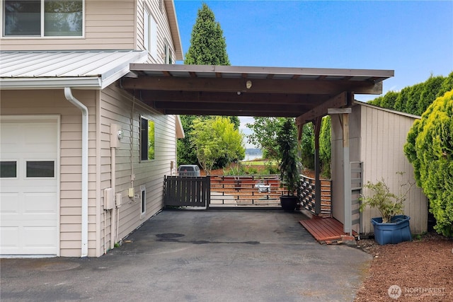 4030 Kamilche Point Rd, Shelton, WA 98584 - view of parking / parking lot with a garage and a gate