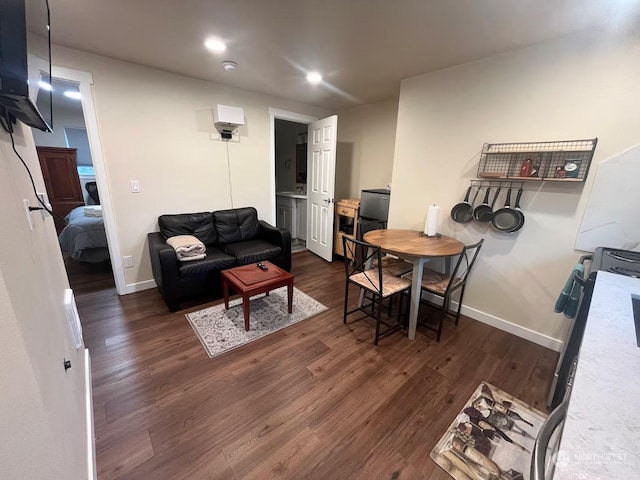 living room featuring dark hardwood / wood-style flooring