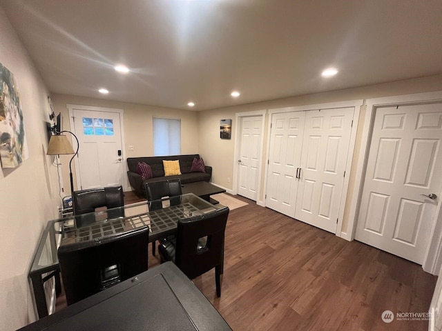 living room with dark wood-type flooring