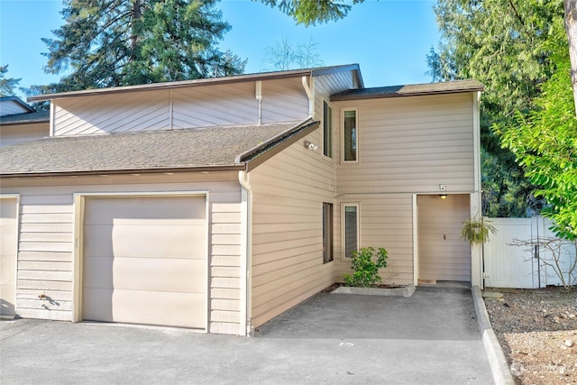 exterior space with a garage