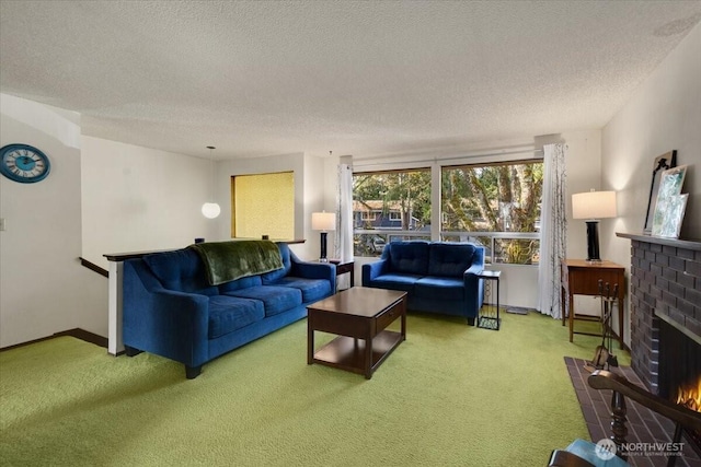 living room with carpet, a textured ceiling, a fireplace, and baseboards