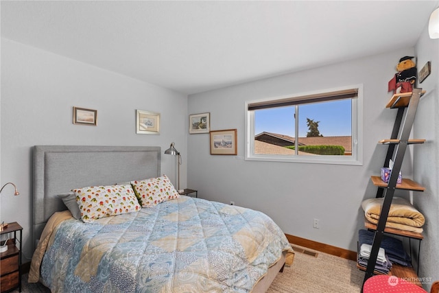 bedroom featuring carpet