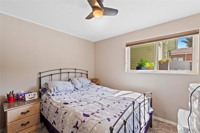 bedroom featuring ceiling fan and carpet floors