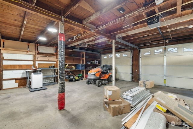 garage featuring a garage door opener