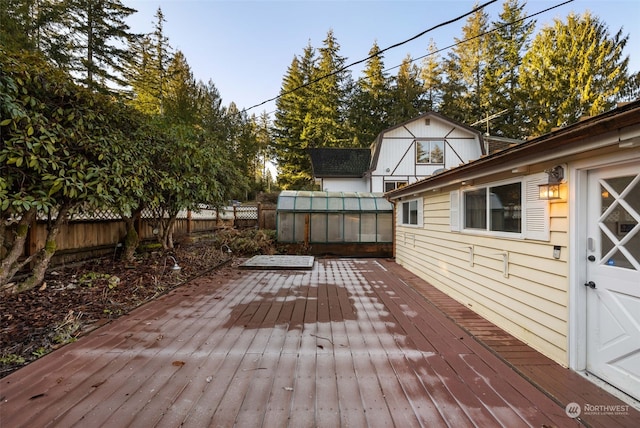 deck featuring an outdoor structure