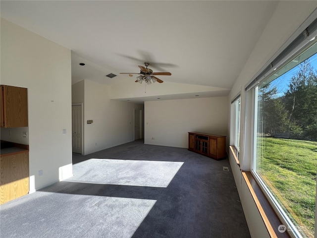 interior space featuring vaulted ceiling and ceiling fan