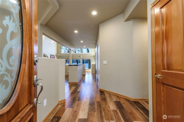 hallway featuring dark hardwood / wood-style floors