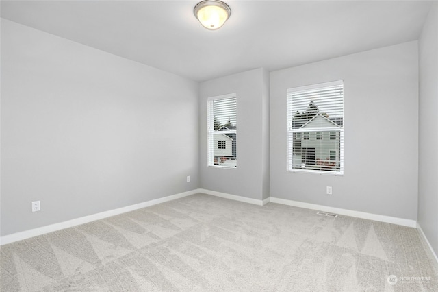 view of carpeted spare room