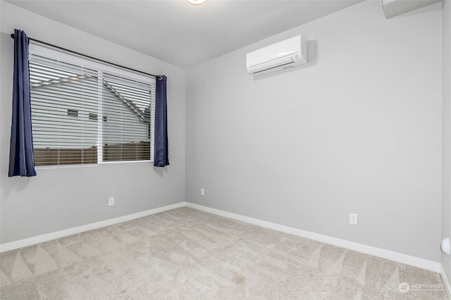 carpeted spare room with a wall mounted AC