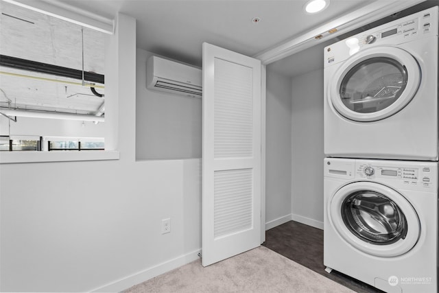 laundry area with stacked washer / dryer, light carpet, and an AC wall unit