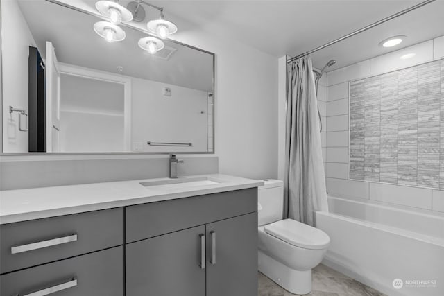 full bathroom with shower / tub combo with curtain, vanity, and toilet