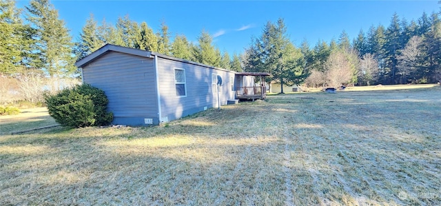 view of property exterior with a yard