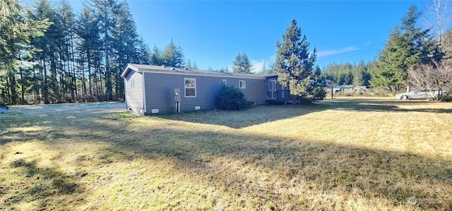 exterior space featuring a lawn