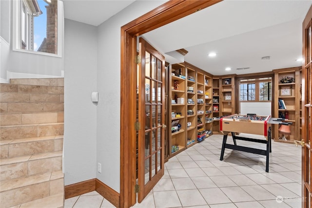 office space featuring light tile patterned floors and a wealth of natural light