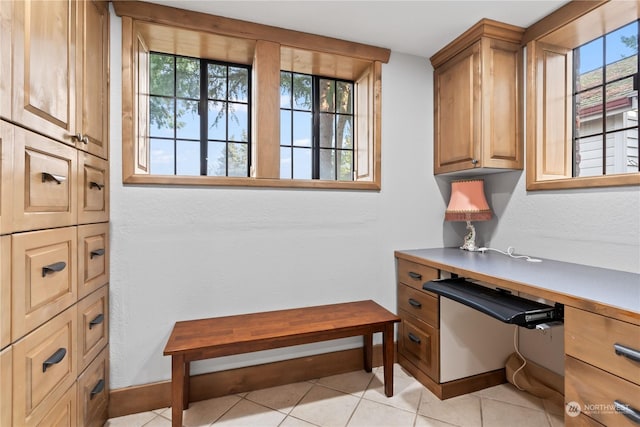 office space featuring light tile patterned floors