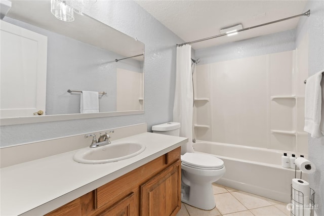 full bathroom with toilet, vanity, tile patterned floors, shower / bathtub combination with curtain, and a textured ceiling