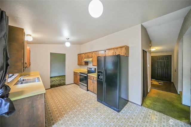 kitchen with sink, black fridge with ice dispenser, and stainless steel range with electric stovetop