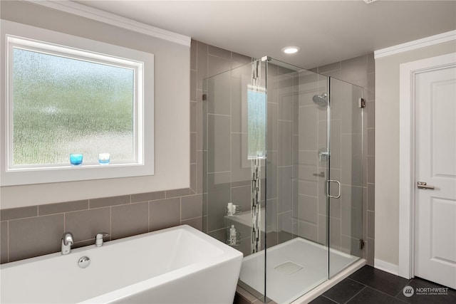 bathroom featuring independent shower and bath, tile patterned flooring, and crown molding