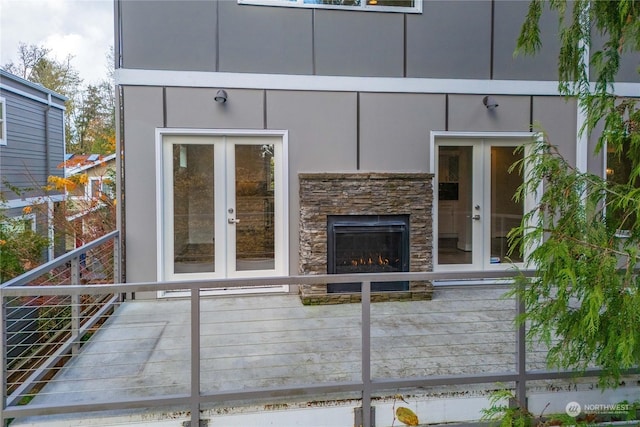 exterior space featuring a wooden deck and french doors