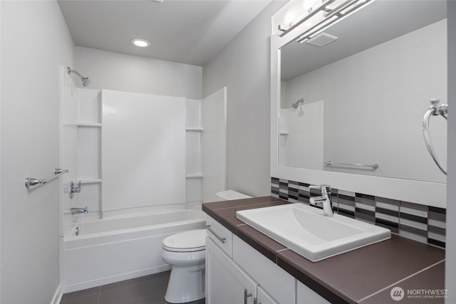 full bathroom featuring visible vents, vanity, toilet, shower / tub combination, and recessed lighting