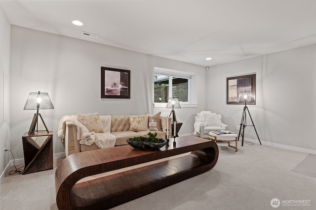 living area featuring baseboards, light carpet, recessed lighting, and visible vents