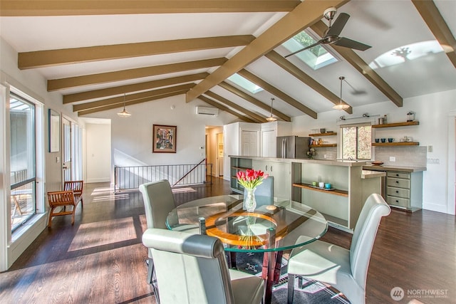 dining room featuring dark wood-style floors, baseboards, a wall mounted AC, vaulted ceiling with skylight, and ceiling fan