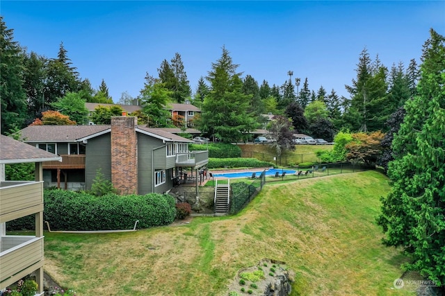 view of yard with a wooden deck