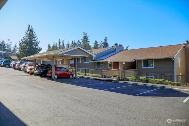 exterior space featuring a carport