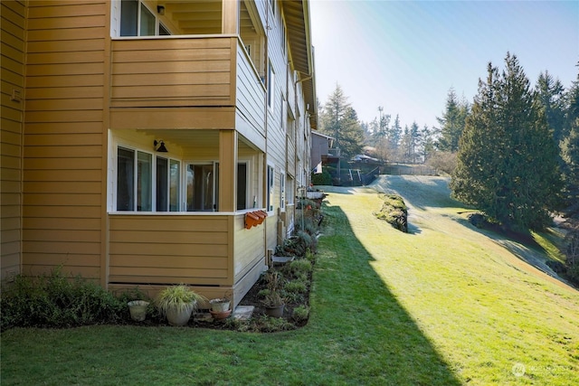 view of property exterior featuring a yard