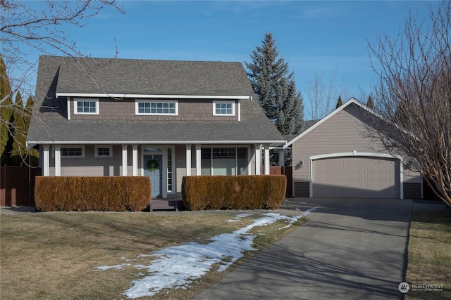 view of front of home featuring a yard and a garage