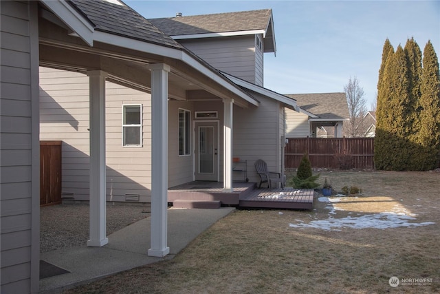 exterior space with a yard and a deck