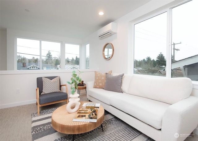 sunroom / solarium featuring a wall unit AC