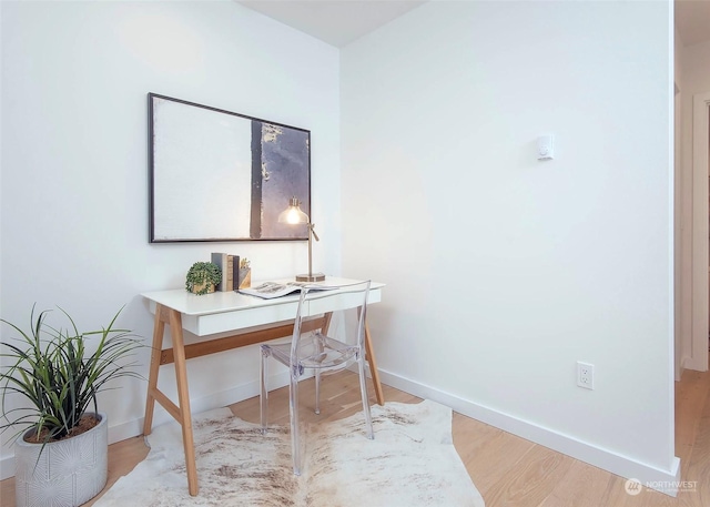 office space featuring light wood-type flooring