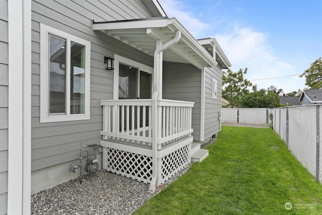 view of property exterior featuring a yard and a fenced backyard