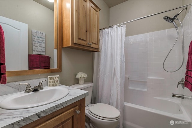 full bathroom featuring toilet, shower / tub combo, and vanity