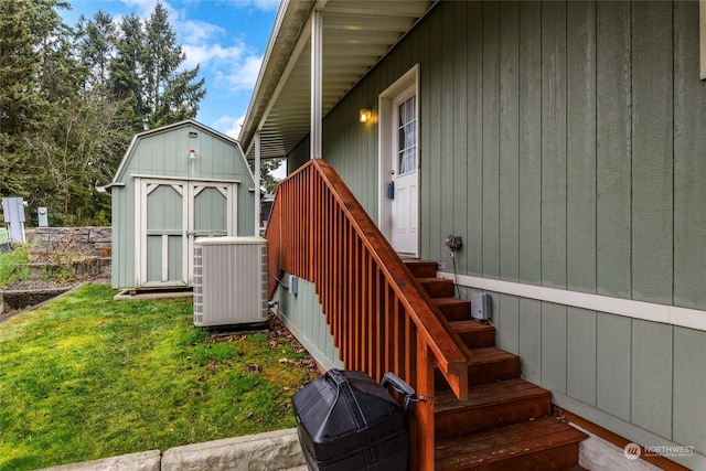 exterior space with a yard and cooling unit