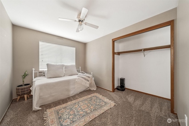 bedroom with carpet, ceiling fan, and a closet