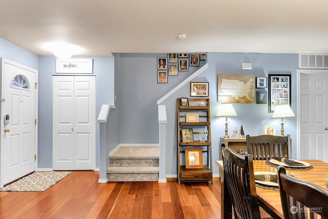 foyer entrance featuring wood-type flooring