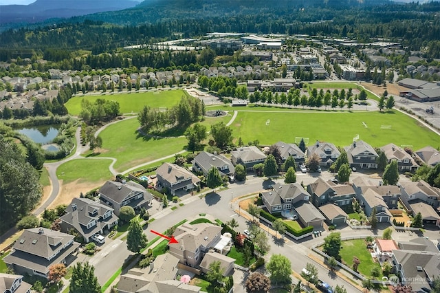 bird's eye view with a water view