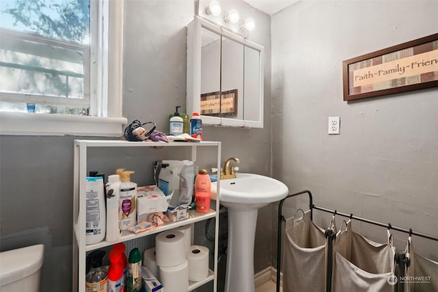 bathroom with sink and toilet