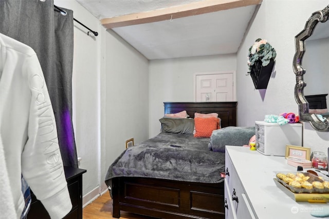 bedroom with light hardwood / wood-style flooring