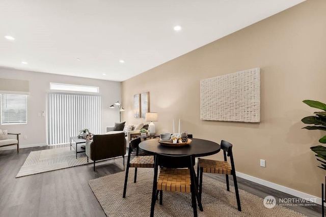 dining room with hardwood / wood-style floors