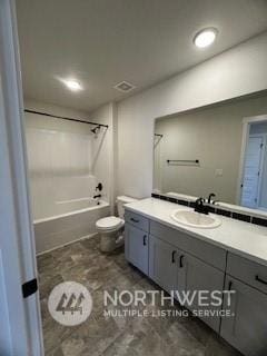 full bathroom with shower / bath combination, vanity, and toilet