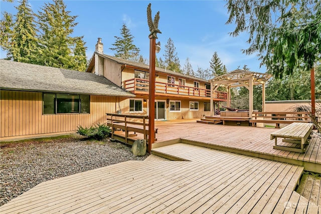 wooden terrace with a pergola