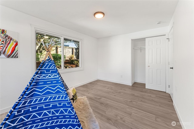 interior space with hardwood / wood-style floors