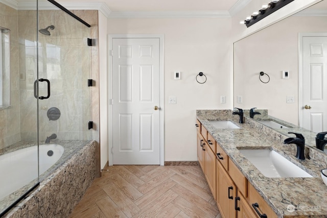 bathroom with parquet flooring, bath / shower combo with glass door, vanity, and ornamental molding