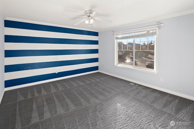 carpeted spare room with crown molding