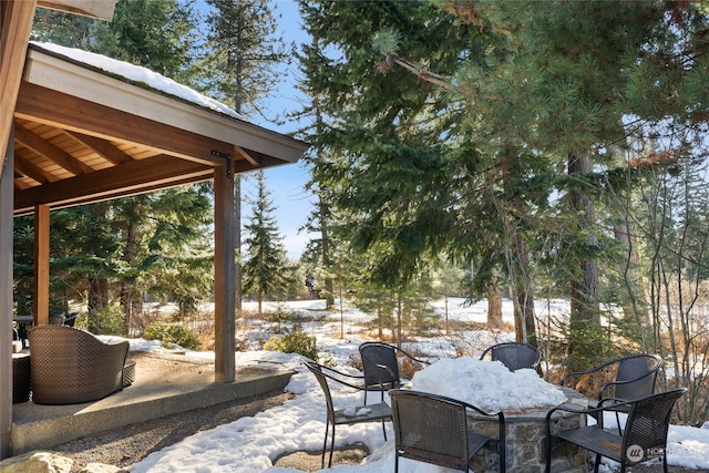 view of snow covered patio