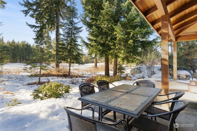 view of snow covered patio