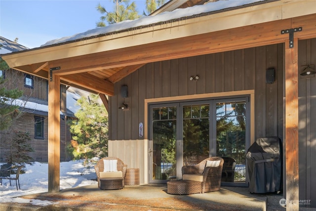 entrance to property with a patio area